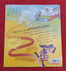 Scholastic Even Heroes Need a Holiday Superhero Hotel, Paperback Story Books | Condition: Pre Loved