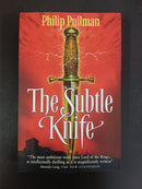 The Subtle Knife by Philip Pullman | Genre: Fantasy